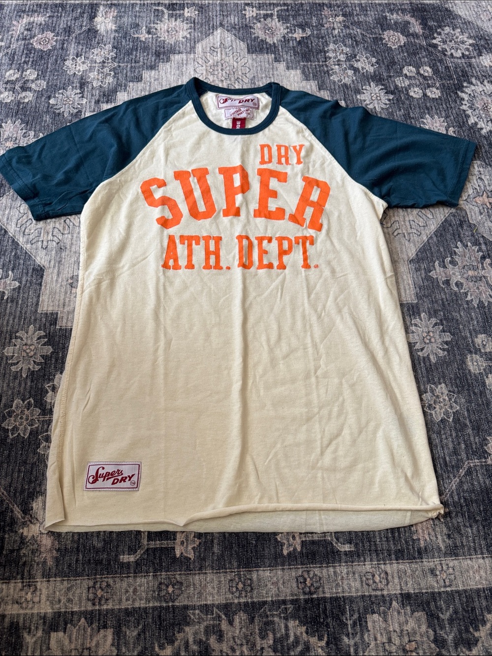 Superdry Cream Tee with Navy Raglan Sleeves and Orange Chest Print